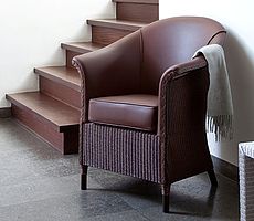 Vincent Sheppard Sessel Vicotr Lounge in braunem Leder mit Ledersitzkissen