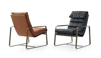 Leolux Sessel Indra pure in braun und Indra plus in dunkelgrau